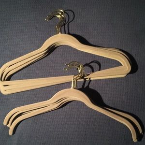 Set of 11 authentic Joy Mangano Huggable Hangers. 5 full and 6 half hangers.
